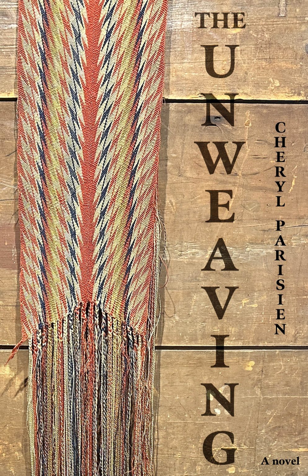 The Unweaving A woven garment in three colours with tassels